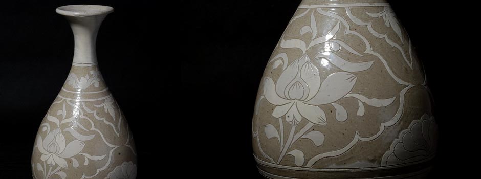 Spring jade pot with white-glazed inscribed flower painting by Cizhou Kiln in Song Dynasty. H:31.5cm 