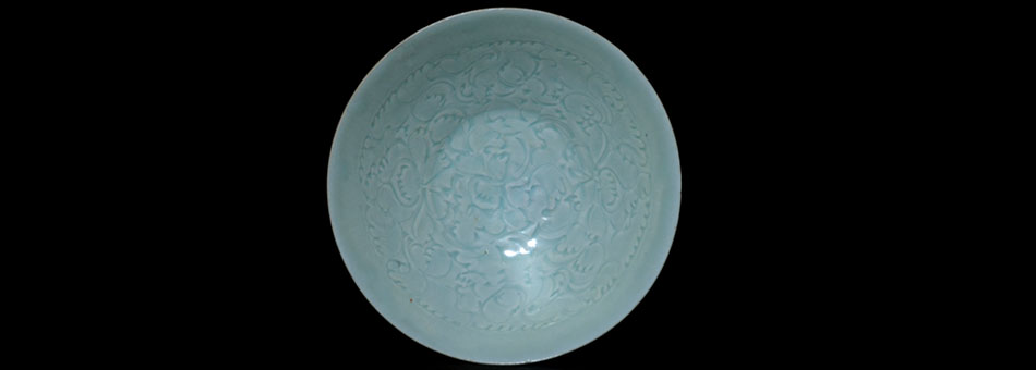  Bluish-white Porcelain Bowl with incised flower and baby playing in the Southern Dynasty